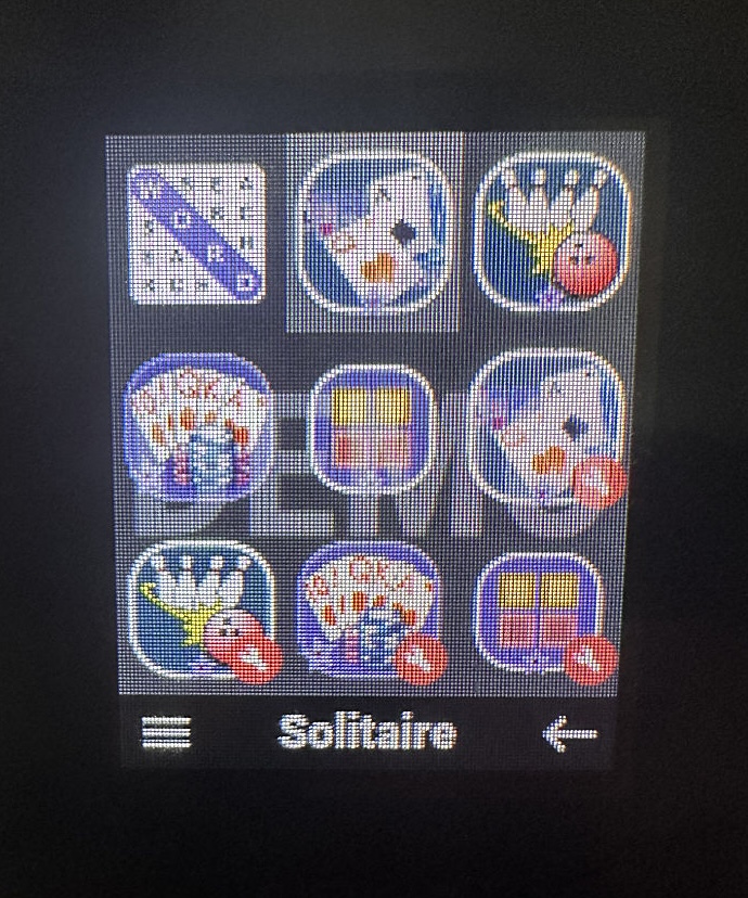 Close up photo of the Nokia TA-1563 screen running Cloud Phone showing published and dev icons of my games